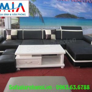 Hình ảnh mẫu bàn trà sofa kính màu trắng đẹp hiện đại khi kết hợp cùng bộ ghế sofa phòng khách màu đen