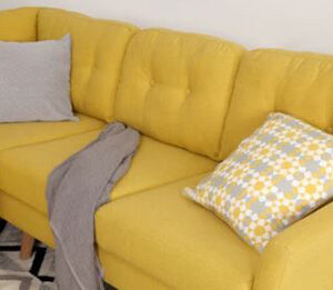 Hình ảnh Chi tiết sofa nỉ đẹp chữ L màu vàng thiết kế rút khuy đính cúc phần tựa lưng