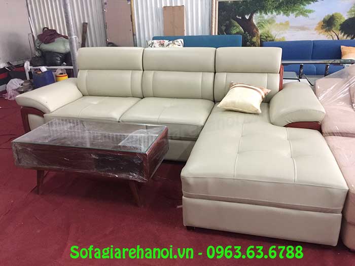 Hình ảnh mẫu ghế sofa da góc chữ L với thiết kế rút khuy và ốp gỗ hiện đại